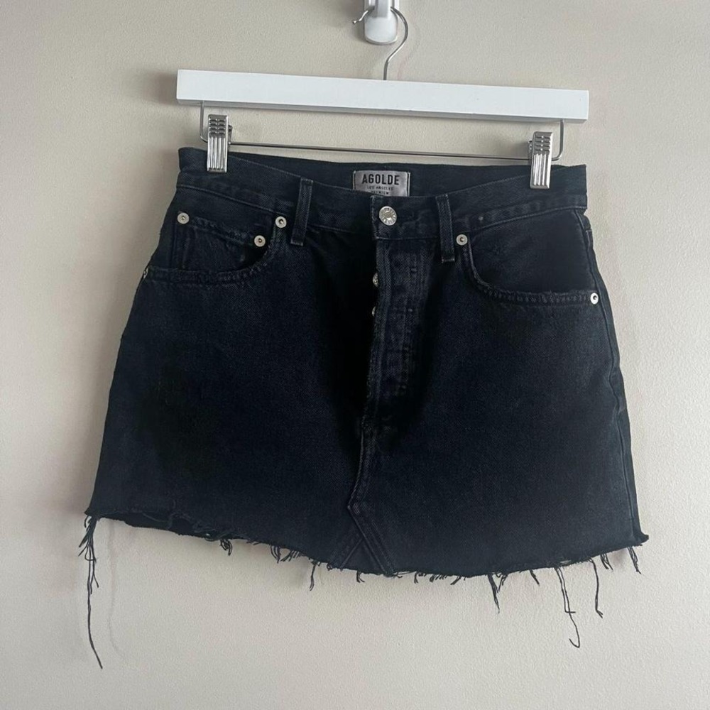 AGOLDE black denim mini skirt size 26 raw hem button fly faded wash 90s grunge